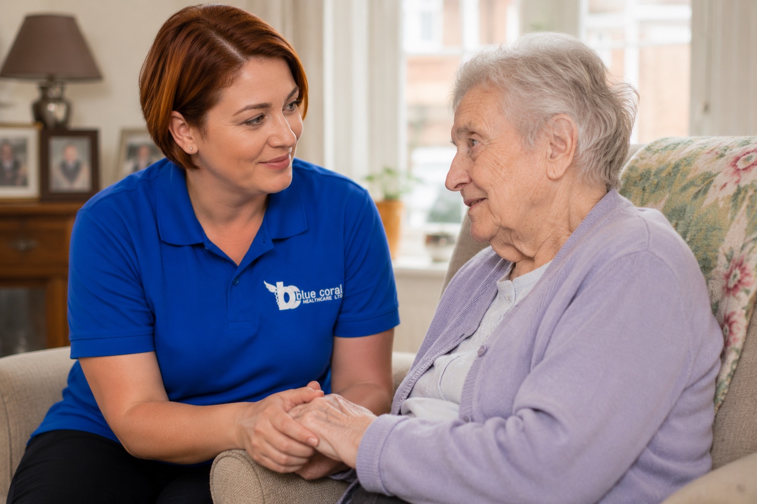 Blue Coral Healthcare carer providing gentle dementia care to an elderly woman at home
