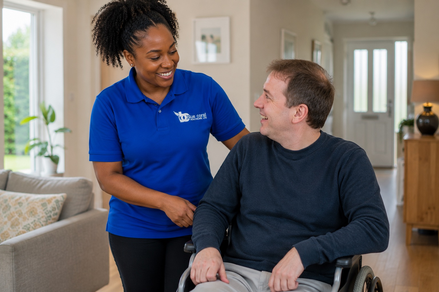 Blue Coral Healthcare carer supporting a wheelchair user with daily living at home in Sheffield