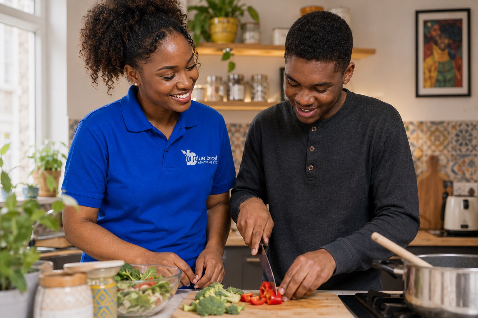 Blue Coral Healthcare supported living carer with a young adult in their Sheffield home